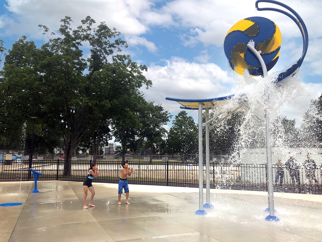 Image of children playing in splash pad at city park